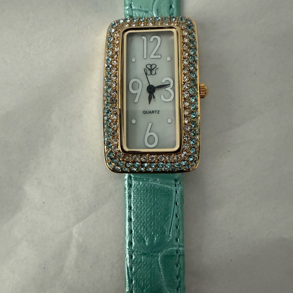Gold and Teal genuine leather strap Bezel Watch